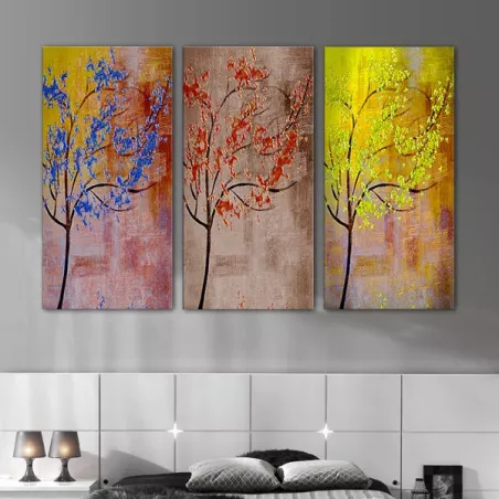 Drieluik van gekleurde bomen